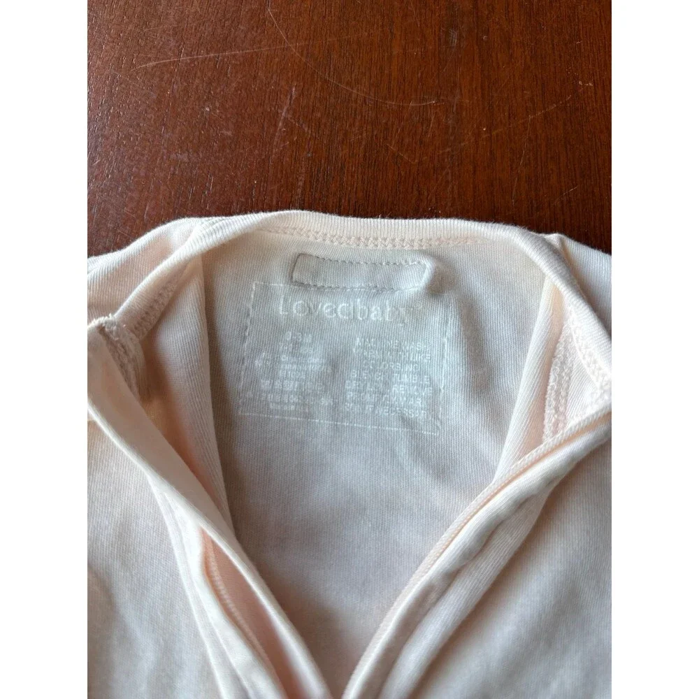 L’OVEDBABY light pink organic footie sleeper